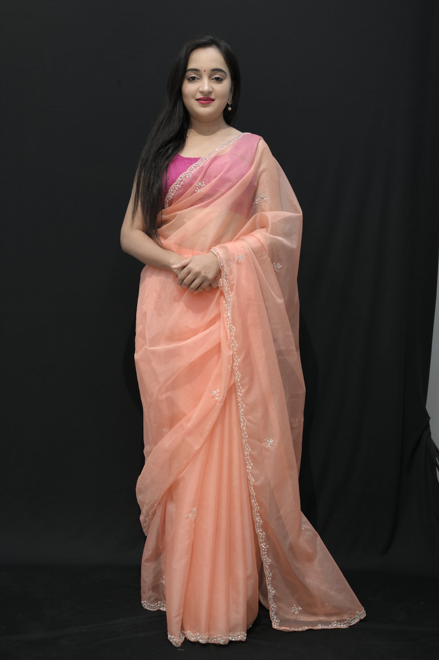Peach Organza Saree with Subtle Embroidery